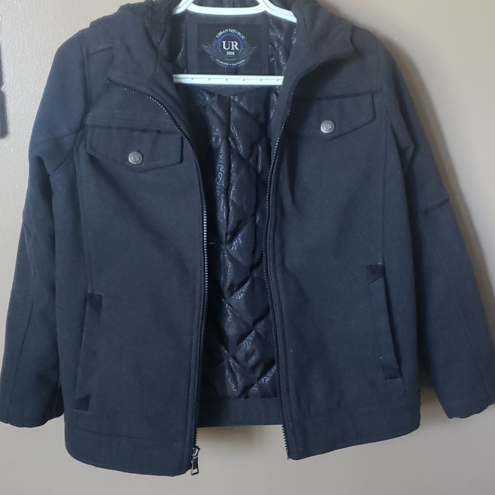 Boys jacket with hood.